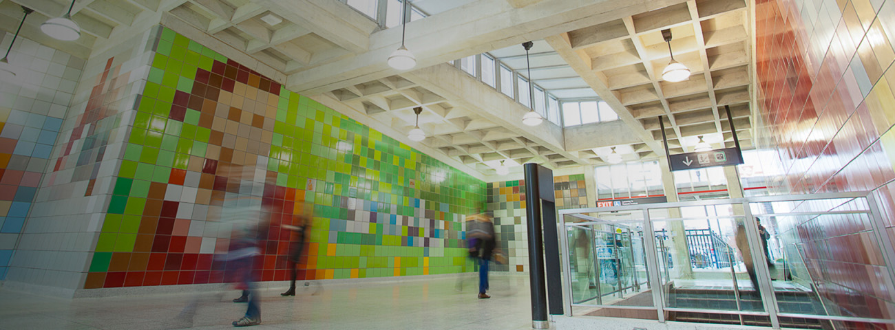 Dufferin Station with modern Interior wall and ceiling with new light fixtures near street level entrance